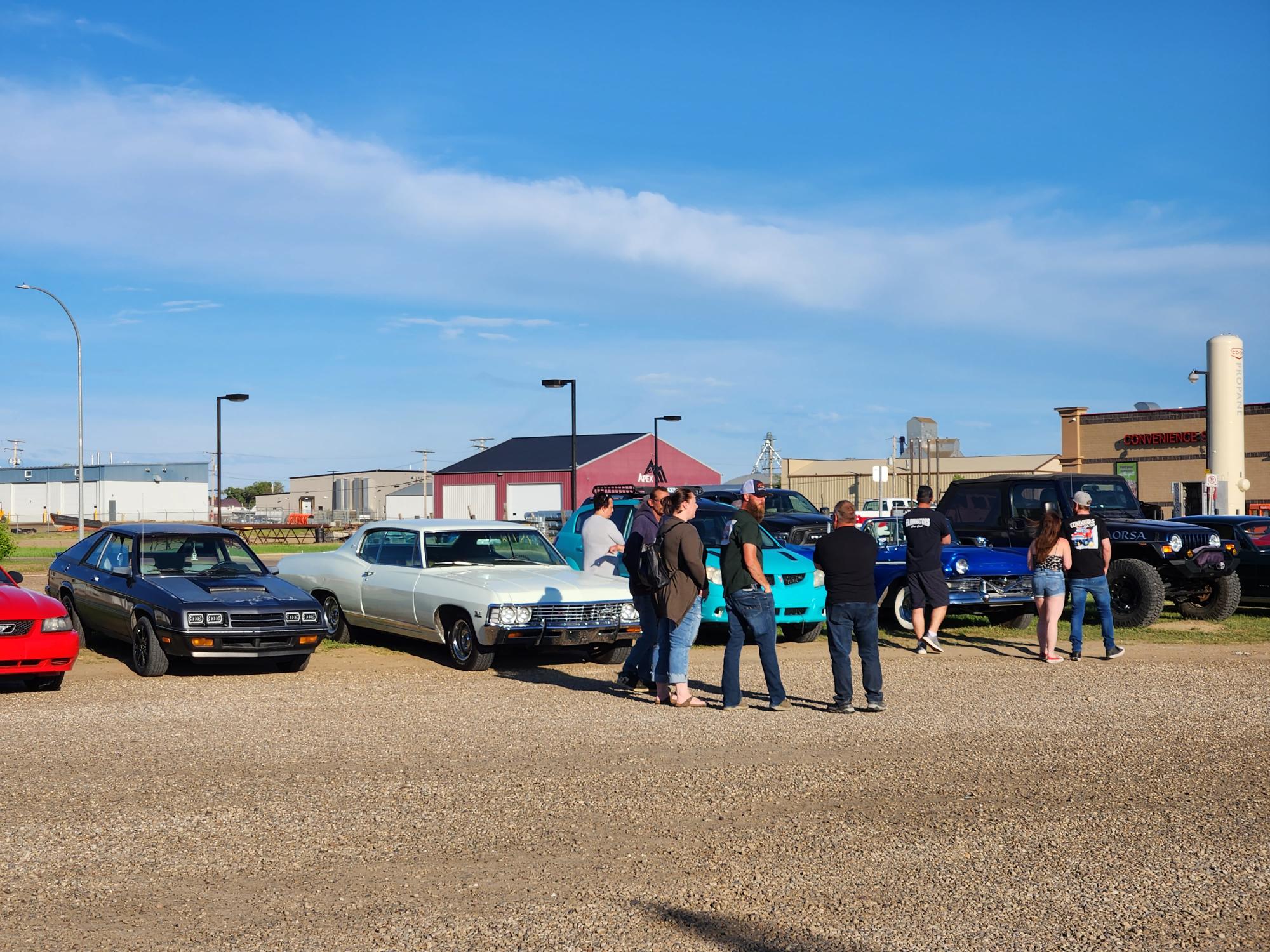 Chrome, cream, and a valve cover racing scene in Shaunavon